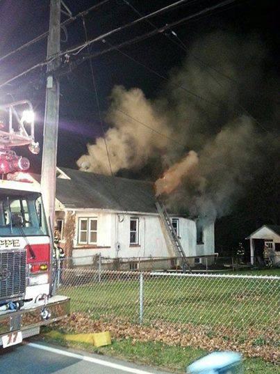 Ladder 77 Arriving with heavy smoke showing 