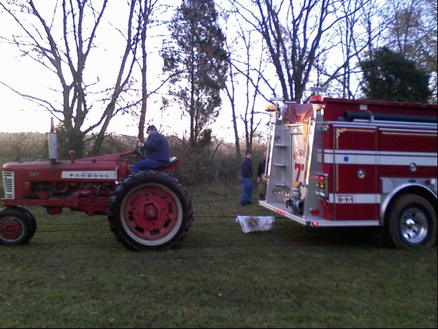 Nov 2008,  Engine 77 gets helped from some very sticky mud on Linfield Trappe Rd.