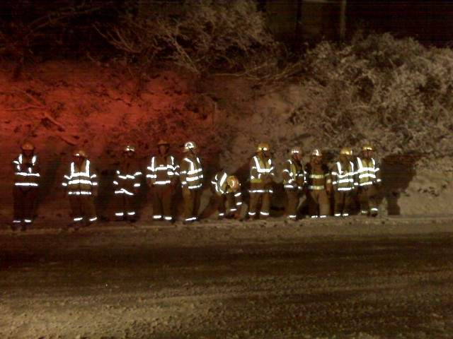 Trappe's Finest posing as Chain Gang members after a Vehicle rescue at Ridge Pike and Kline Rd.  Actually the guys were watching a PennDot contractor spread salt on the slick roads, just after a surprise snow fall.  1/19/2009  